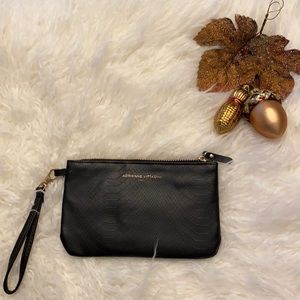 Clutch with detachable strap and built in phone charger. EUC